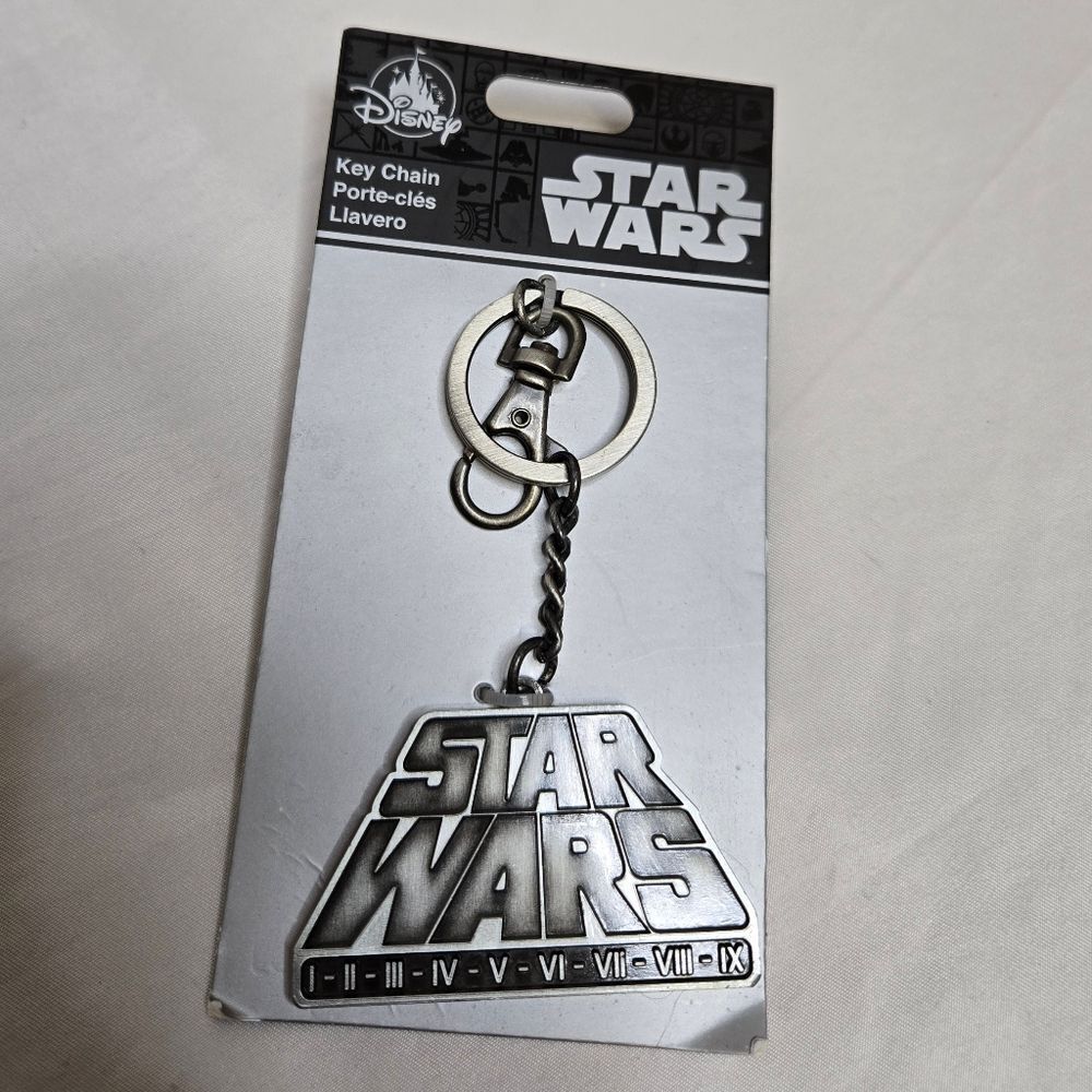 NEW Star Wars‎ logo episodes 1-9 Disney Parks silver heavy keychain bag charm